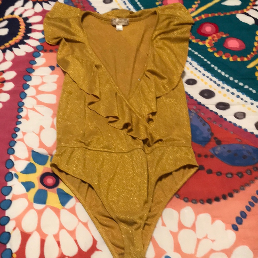 Sparkly mustard gold body suit